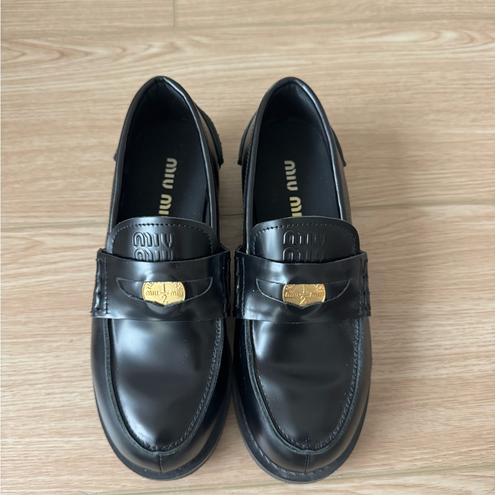 Miu Miu Black Flats with Gold Detail